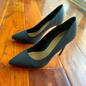 Matte black pumps